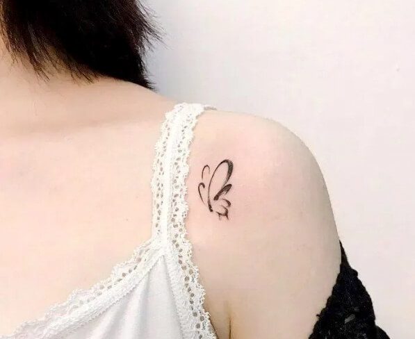 Mini tattoo on shoulder for women shape 25