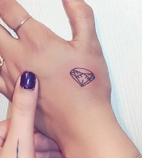 Hình xăm kim cương ở mu bàn tay hình 4